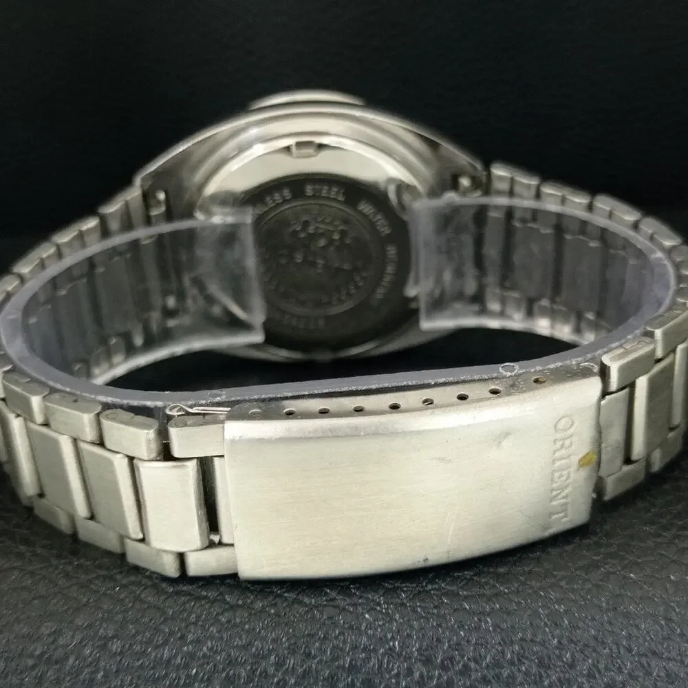 Vintage 1982 Orient Automatic Mens Silver Watch W/daydate & Patina accents